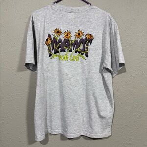 Marmot Mountain Works T shirt with flower embroidery and screen print logo